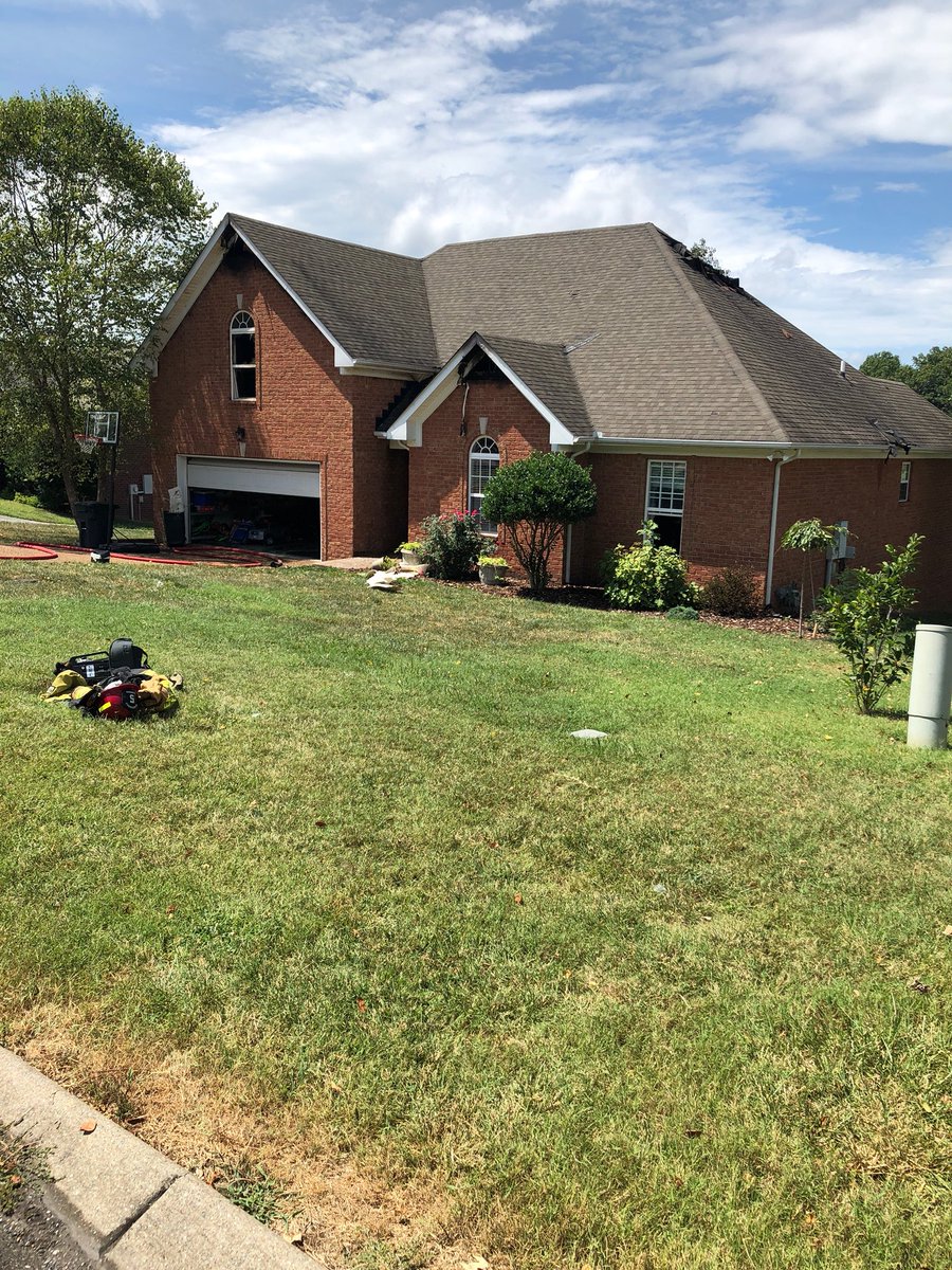 sbush9's tweet photo. This lightning strike was caught from a neighbors security camera...other pic is results of HFD stopping a running attic fire...GREAT job #HFDSTRONG...#firefighters #hendersonvillestandard https://t.co/5V1RqBDKmI