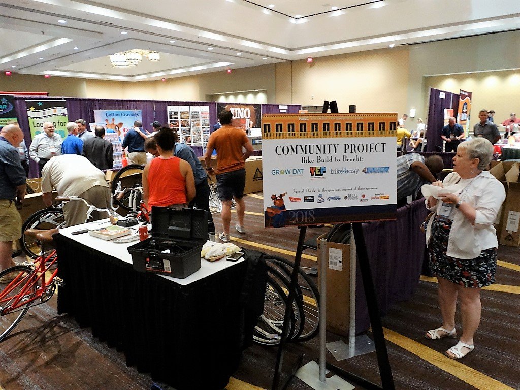 nacconcessions's tweet photo. NAC Expo attendees build bikes for NOLA teens. #nacexpo #wherefoodmeetsfun @GrowDatNOLA https://t.co/NibGFBEnWV