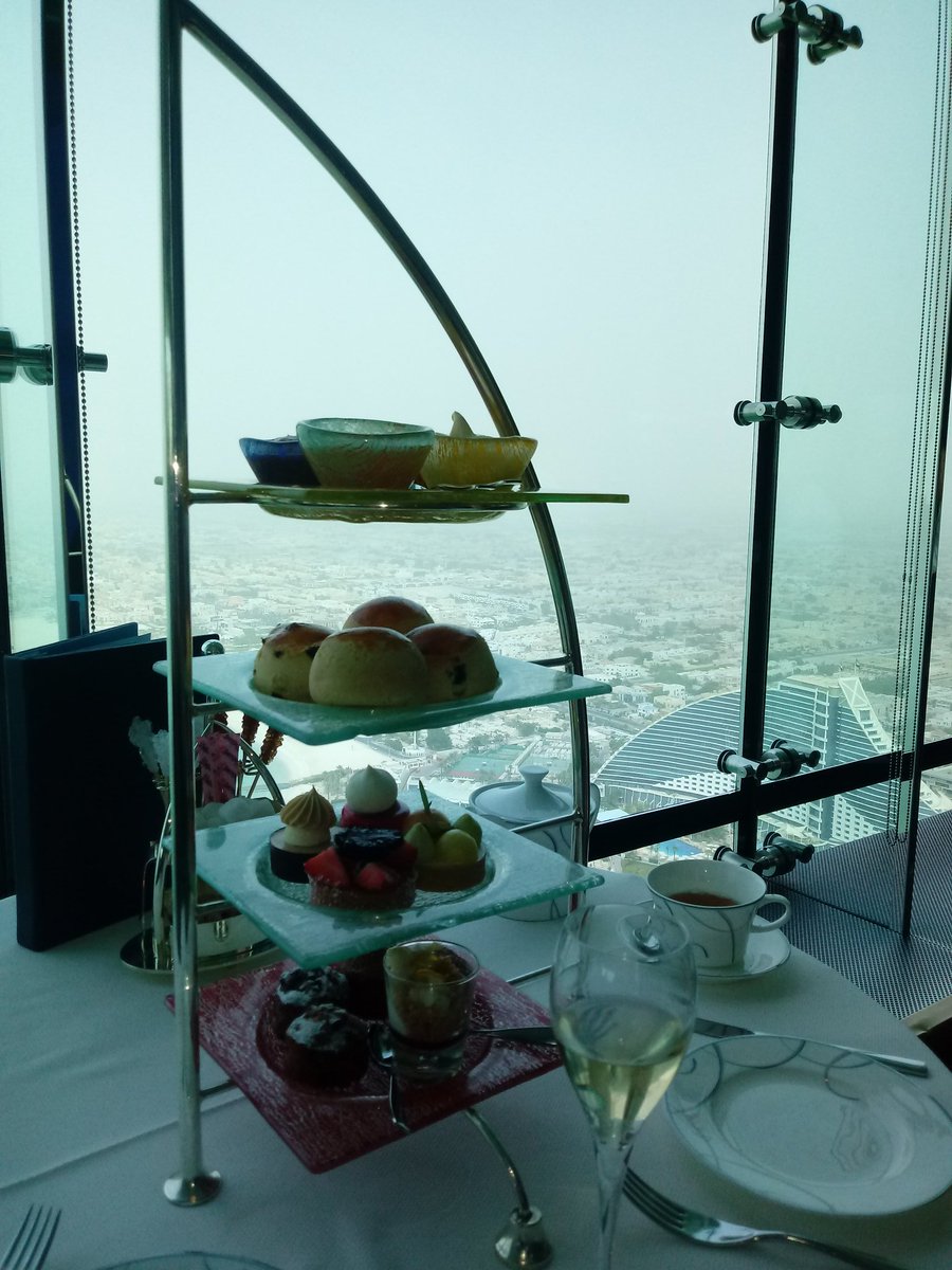 keithybe's tweet photo. Afternoon tea at Burj Al Arab 7 star hotel sky view bar. Think I'm going to burst with to much food. Expensive but worth it https://t.co/UNN2upHk8p