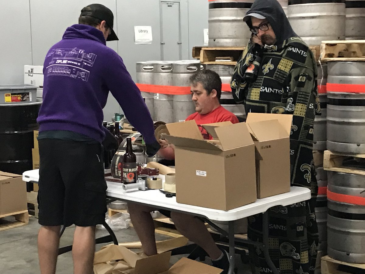 Hey <a href="/Saints/">New Orleans Saints</a>! I’m spending #SaintsGameday hand labeling beer bottles in a giant cooler whilst adorned in my Saints snuggie. #WhoDat