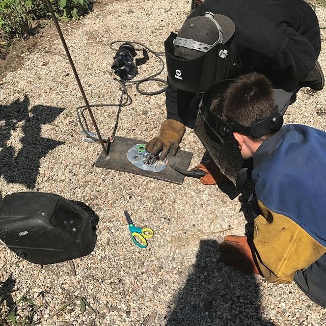 Participants welding as part of Arts in Parts