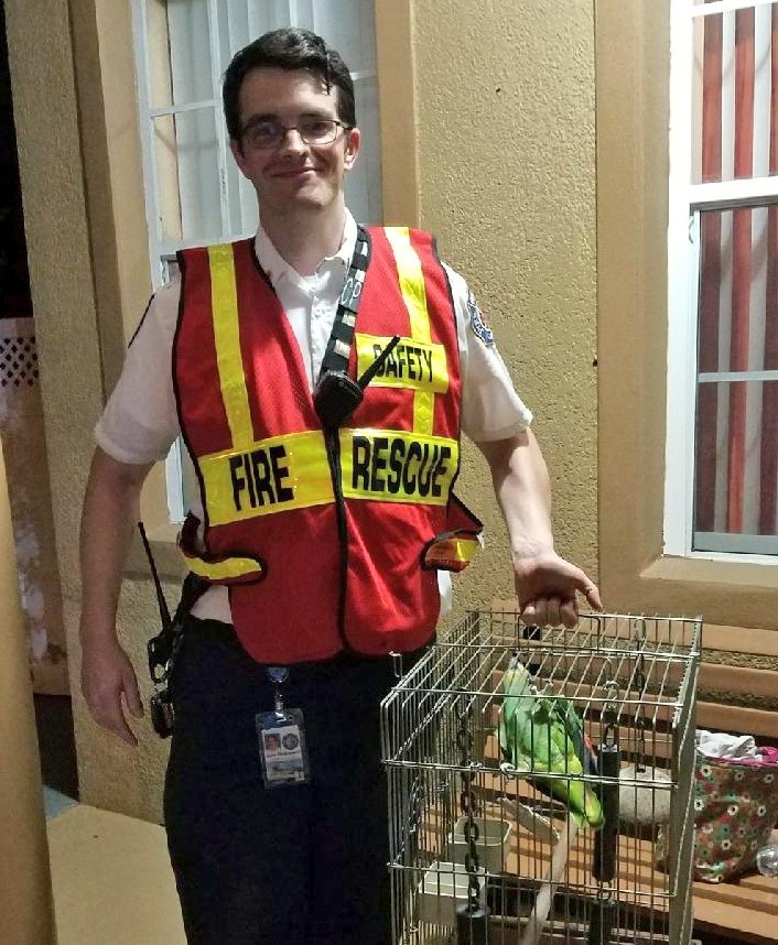 OCFireRescue's tweet photo. Final #update from #lightning strike fire on Old Glory Dr.
#animalrescue
#OCFR Capt. John Parkhurst, first on scene, rescued Praim, the family's parrot from the house. https://t.co/h65HhZR2DY