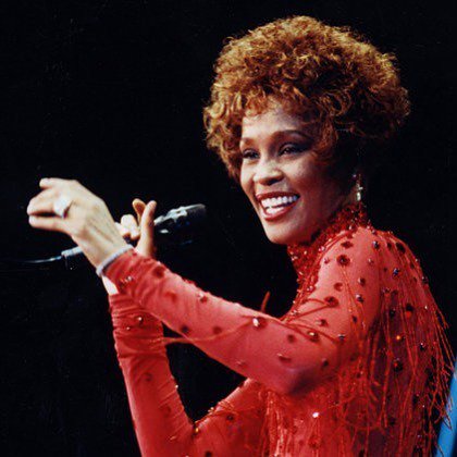 Happy Birthday to The Voice Whitney Houston  We think she looks ravishing in red 
