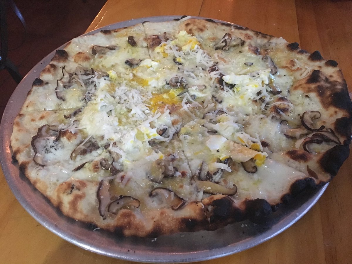 WaqarVick's tweet photo. The truffle pecorino pizza at ⁦@NomadPizza⁩. After years, this continues to remain my favorite pizza in Philly. Truffle oil and mushrooms and a cooked egg on a pizza make for a heavenly combo. https://t.co/VC7cO7nWNZ