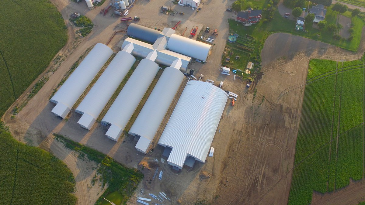 cpfarmsltd's tweet photo. The @meridianmfg super single structure near completion. #fatkid #spudhouse I can't believe the efforts of the @SWMWdesignco crew in this incredible heat we are having lately. They understand we have a crop of @AlbertaPotatoes that needs a winter home! #IVI and urethane left. https://t.co/p6L9HDF5fF