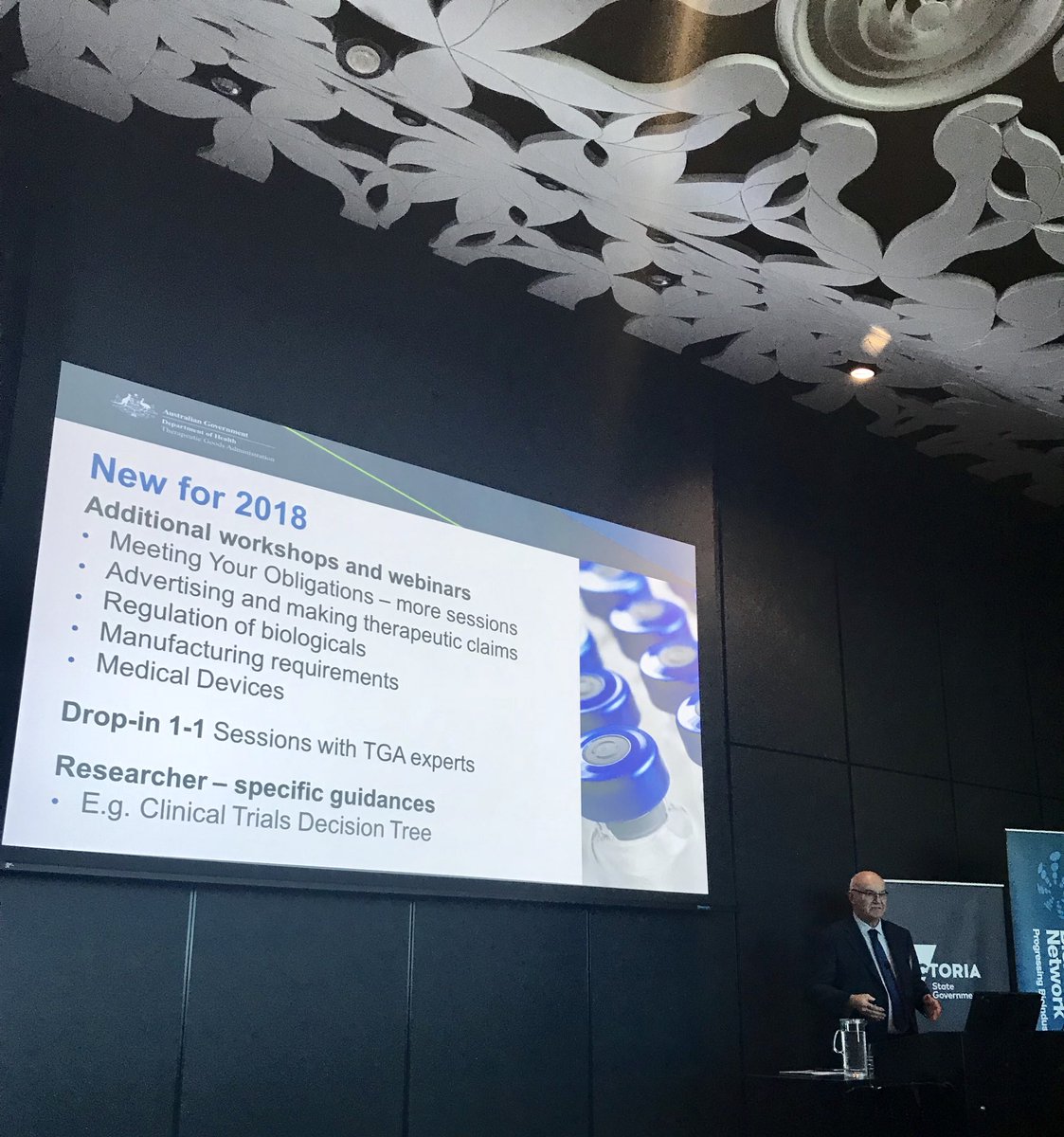 GamzeIsitman's tweet photo. What’s new from the TGA. See slide below - Adj. Prof. John Skerrit #biotechdev18 https://t.co/F9fHGeLRgC