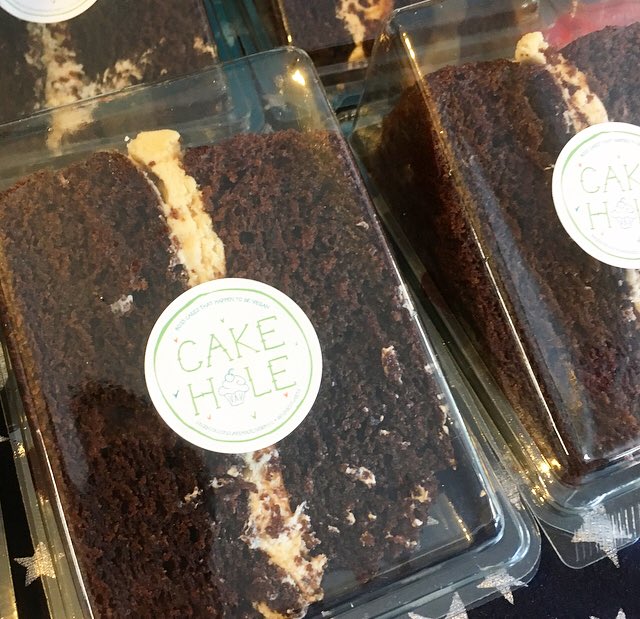 PurpleCarrotLiv's tweet photo. There’s chocolate caramel cake in the shop!! New flavour slice from @flourytweets 😍 Friday treats! #vegan https://t.co/c4S6R5saoy