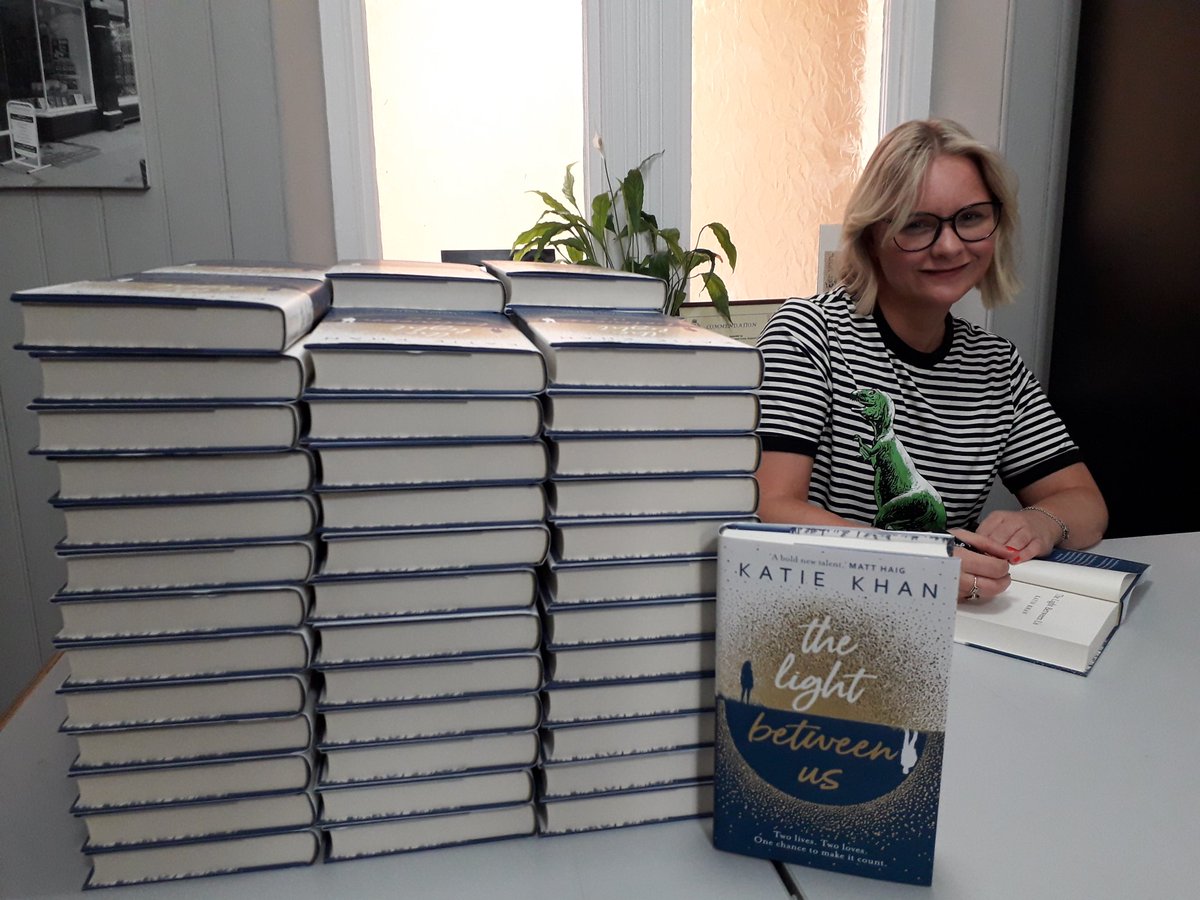 We have signed first editions of #TheLightBetweenUs . A huge thank you to @katie_khan for coming in this morning to sign this stack for us! It looks great!