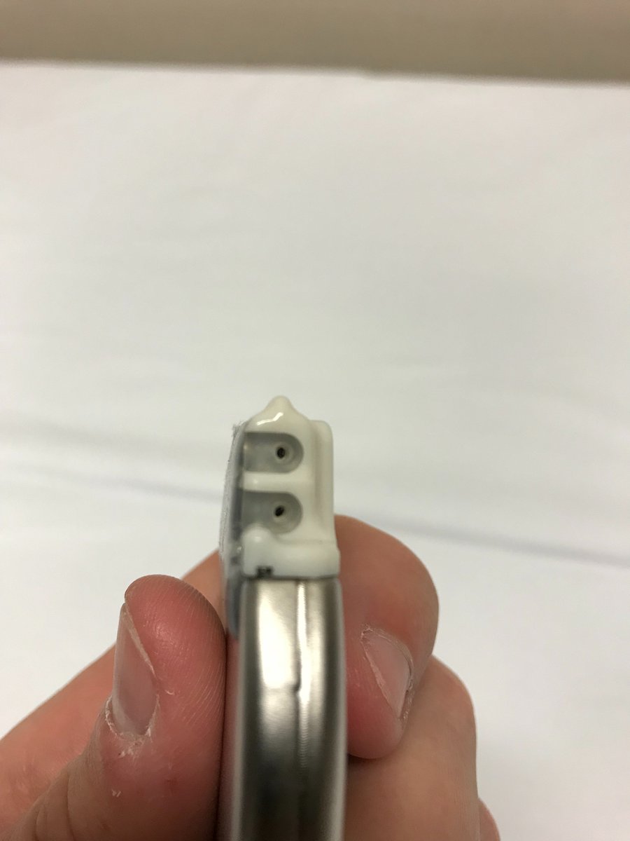 The contact point end of the leads are placed inside of the IPG. The leads are slid into position (pictures 1,2), and secured with a small screw and screwdriver (picture 3). At this point, the electrodes in the epidural space have been placed in continuity with the IPG.
