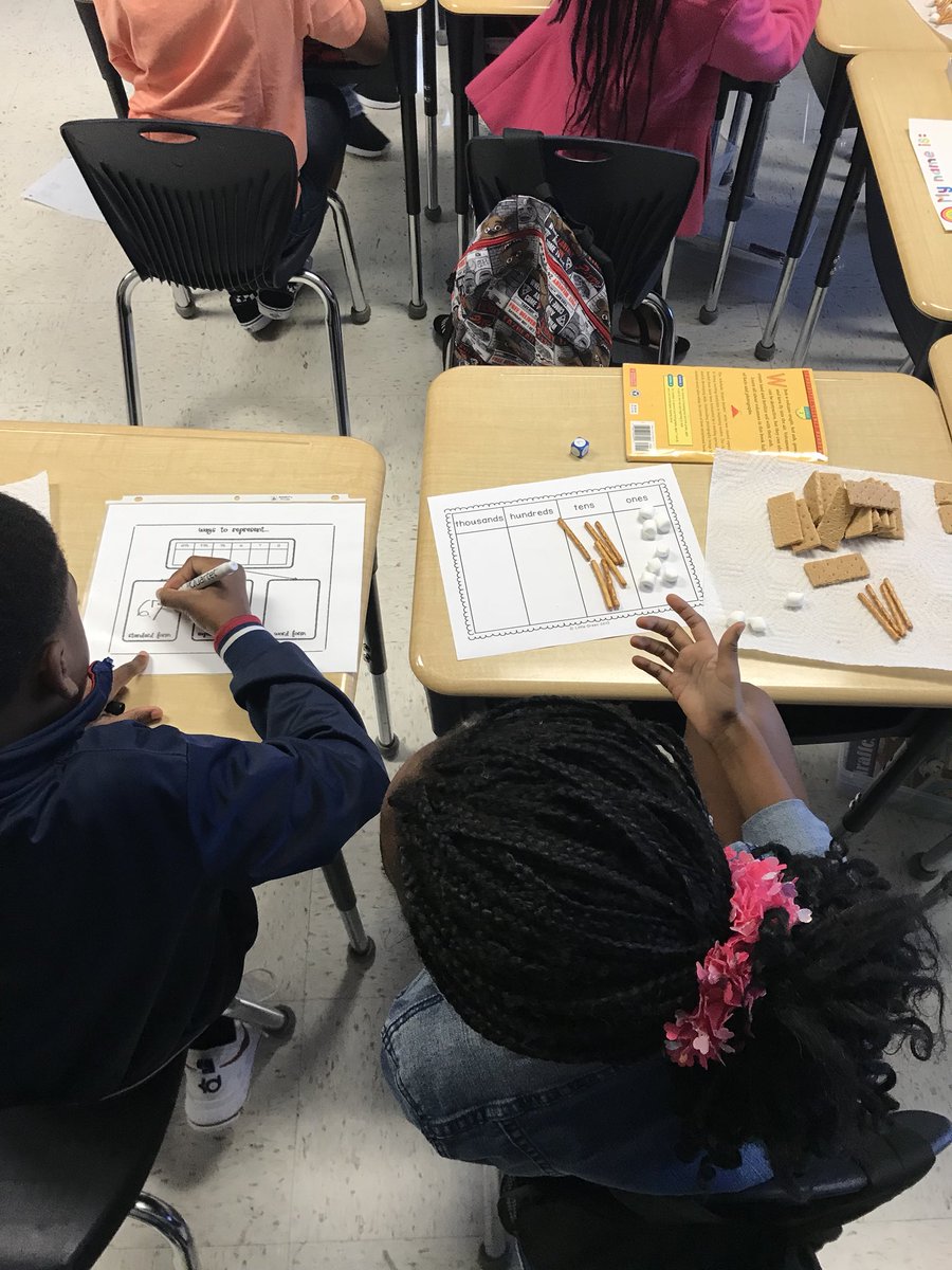 CoachCrumbley23's tweet photo. Place value lesson with edible manipulatives. Third grade math is fun! @aprpes2005 @FHES_TWEET #keystosucess https://t.co/IdB5dgoYI9