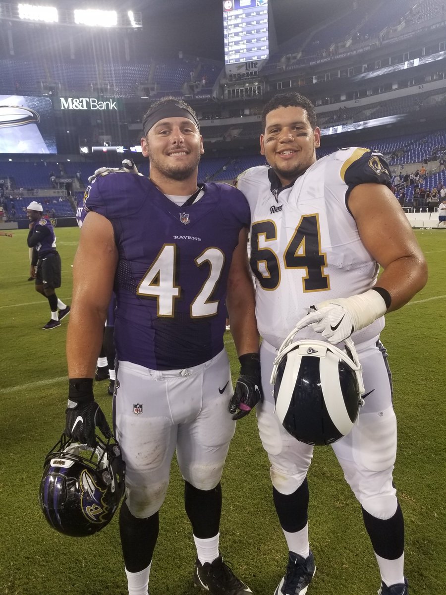 BlackBearsFB's tweet photo. Orono ➡️ @NFL 

Former Black Bear teammates @PRic508 and @TeamDemby pose for a photo following their NFL Preseason match-up!

#BlackBearNation #BearWitness #CAAFB https://t.co/6NmAy0b3e9