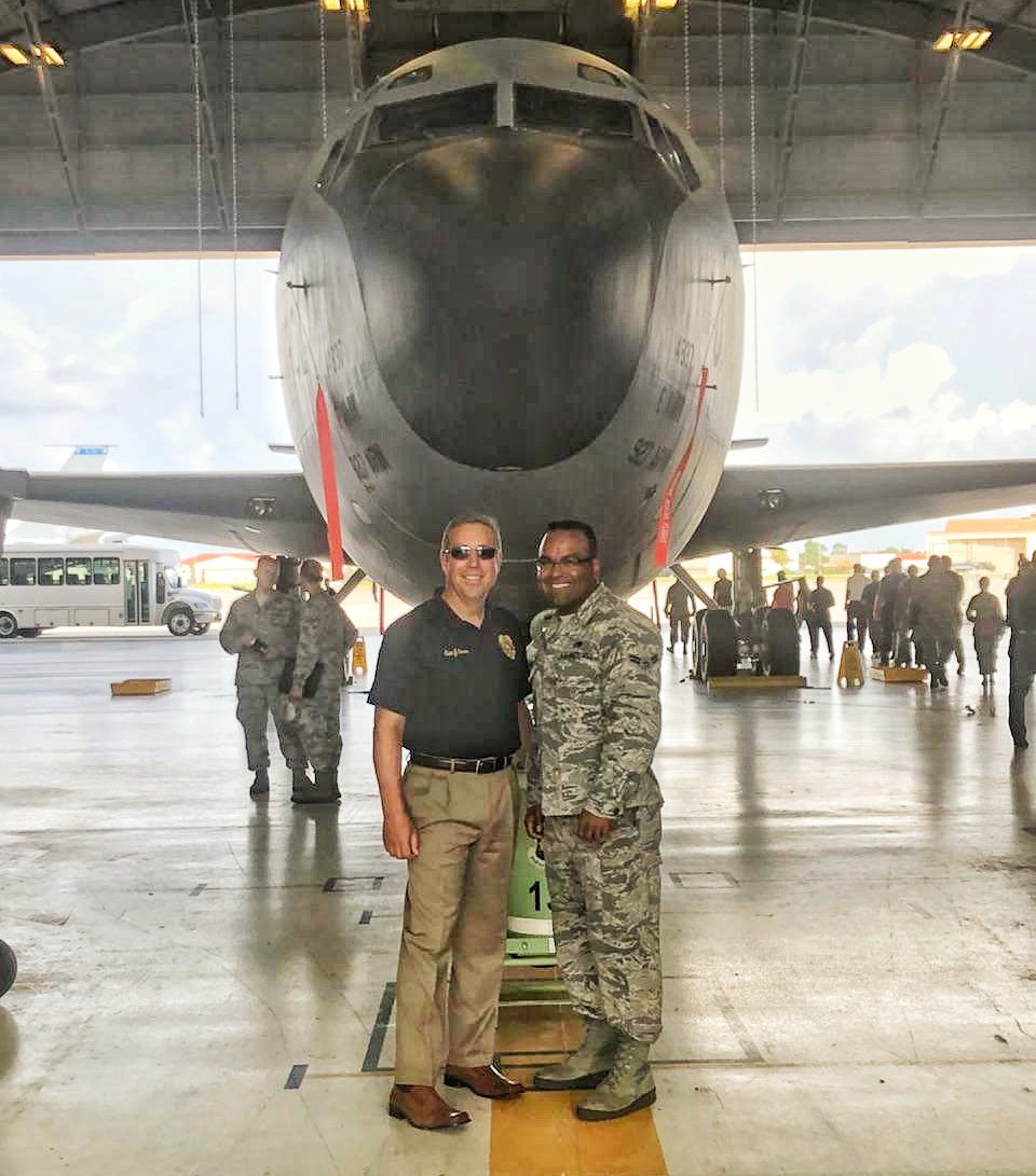 PCPD is proud of its citizen - soldier Officer Eric Cruz. He is a reservist,  in the 6th Air Mobility Wing at MacDill Air Force Base, in Tampa. He is currently in training and will complete training in September. Captain Jerry Stwan is with Eric in front of a KC-135 Stratotanker