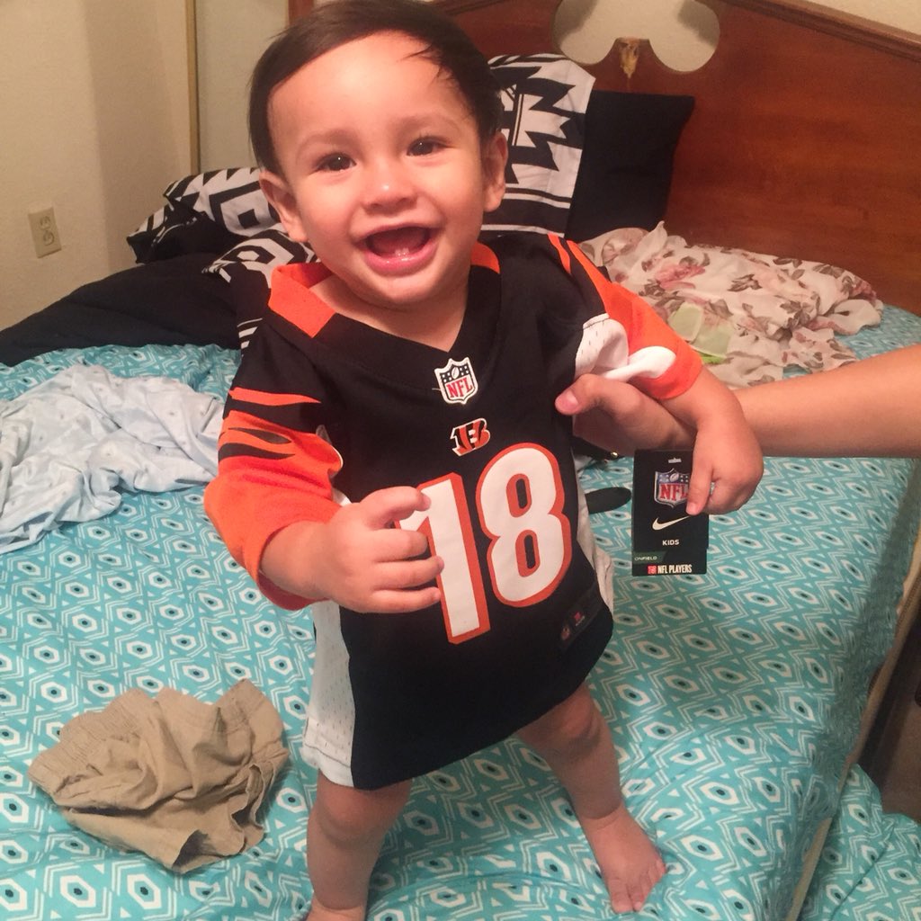 WhoDeyXxX's tweet photo. He loves his early birthday present! I couldn’t wait till the 22nd! #WhoDey #TheJungle #IanMatthew @Bengals @ajgreen_18 https://t.co/47US9RKr49