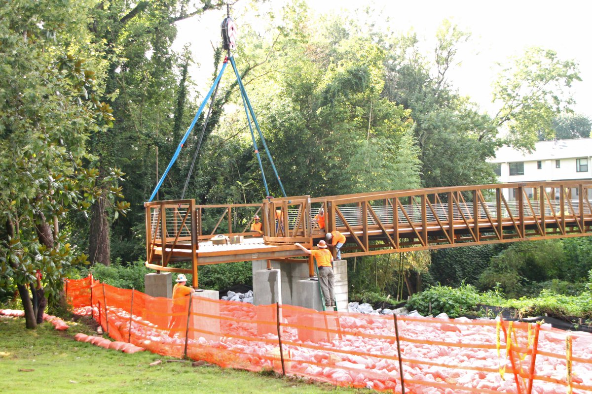 PATHFoundation's tweet photo. Years of planning and design,  24 hours with a very large crane, and a new bridge spanning Peachtree Creek!  Watch for the new @PATHFoundation   #bike #path on our Northwest BeltLine connector trail (coming soon)!  Thanks Astra construction and KAIZEN design! https://t.co/L3P80OVI47