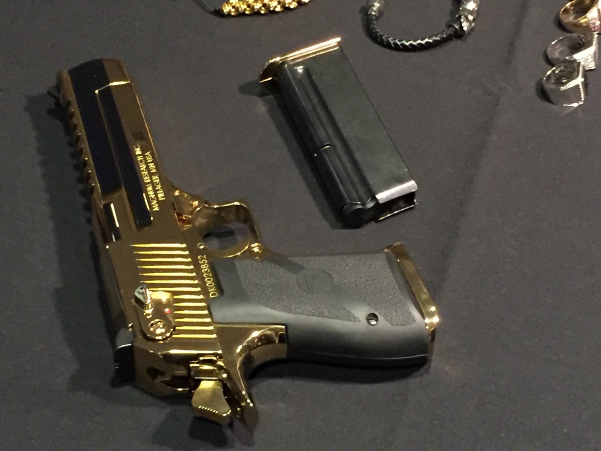 kbolan's tweet photo. Gold plated gun seized during VPD investigation into Kang gang/Red Scorpions https://t.co/sCj5MkFl9Z
