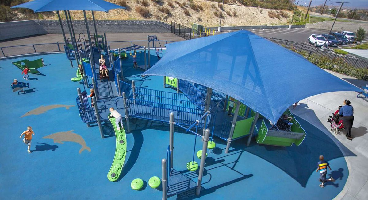 PlayCoreNews's tweet photo. The sea-themed playground at Valley View Community School in Newhall, California allows children of all abilities to play side-by-side together. #FeatureFriday #NDSPlayCore #Inclusion https://t.co/lJZRU6Donu