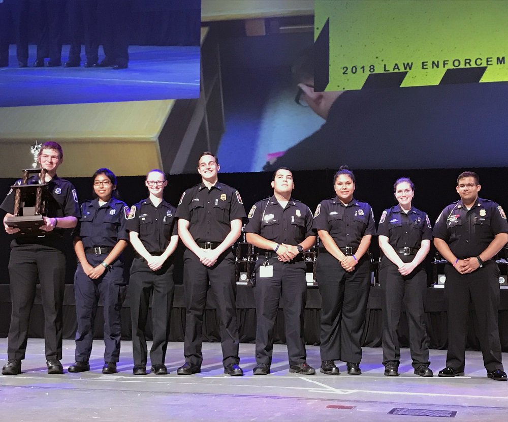 FairfaxCountyPD's tweet photo. Hard work pays off! π Our Explorers competed against 2,000 others at the National #LawEnforcement Exploring Conference at Purdue University, winning the 2nd place trophy for White Collar #Crime. The team was advised by PFC Curcio and Sergeant Woehrlen. Congrats all! #FCPD #NLEEC https://t.co/ptctnhseJM
