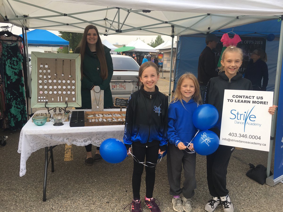 StriveDanceRD's tweet photo. We’re down at the Market at Red Deer spending the day next to community members Adriana Lagrange, Adele Poratto, and Joy in the Gems. Drop by to say hi! 😀💙 https://t.co/tGcGuRaSxk