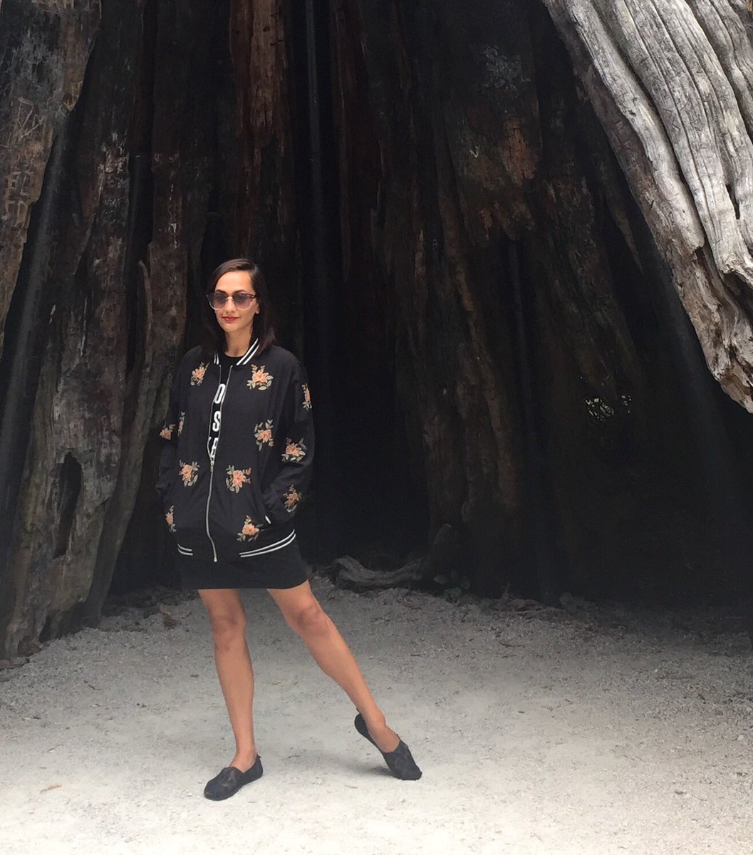 Standing COMPLETELY naturally inside an 800 year-old cedar in Stanley Park. #vancouver #dancerpose