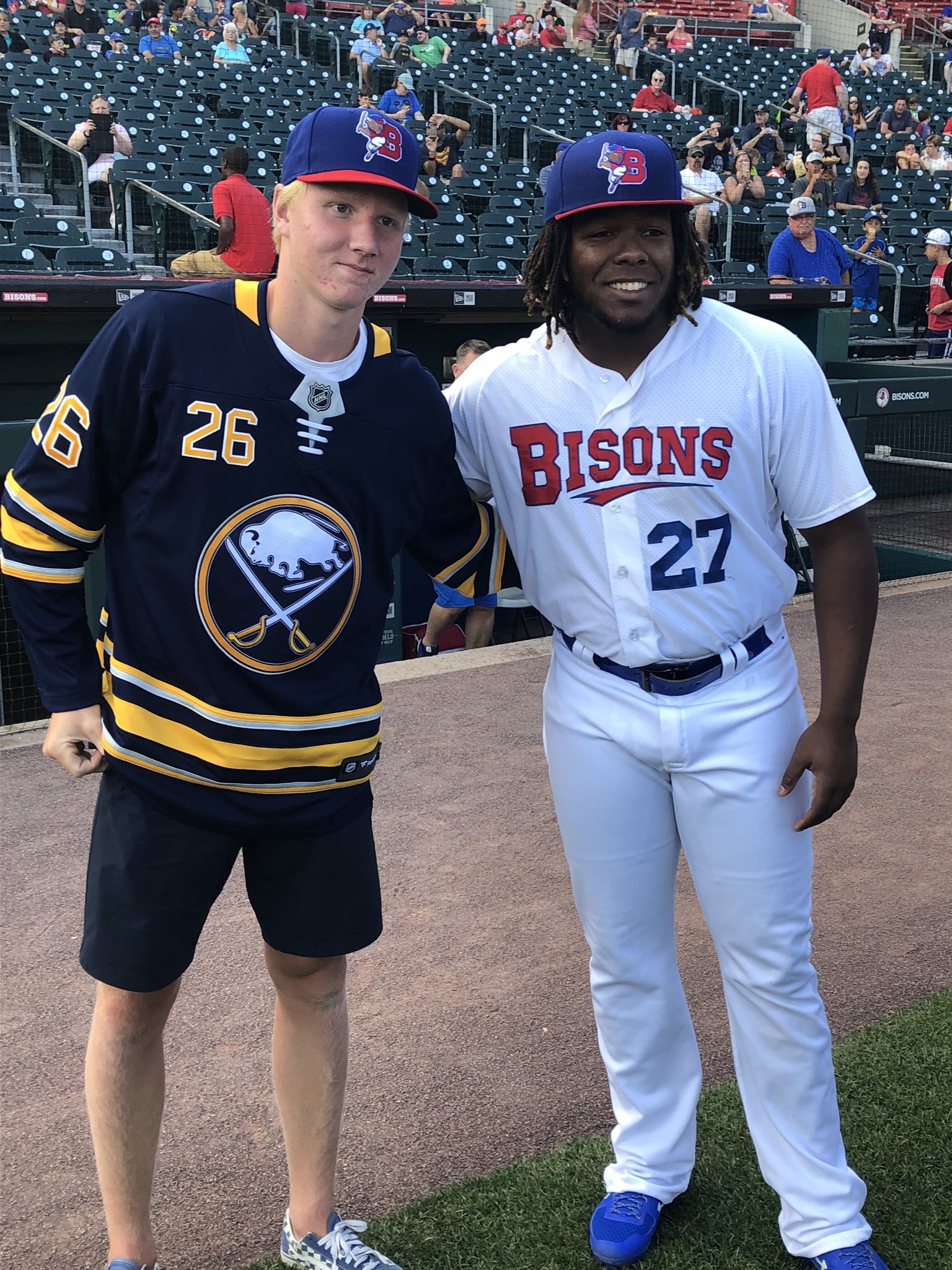 Buffalo Bisons third baseman Vladimir Guerrero Jr., right, looks