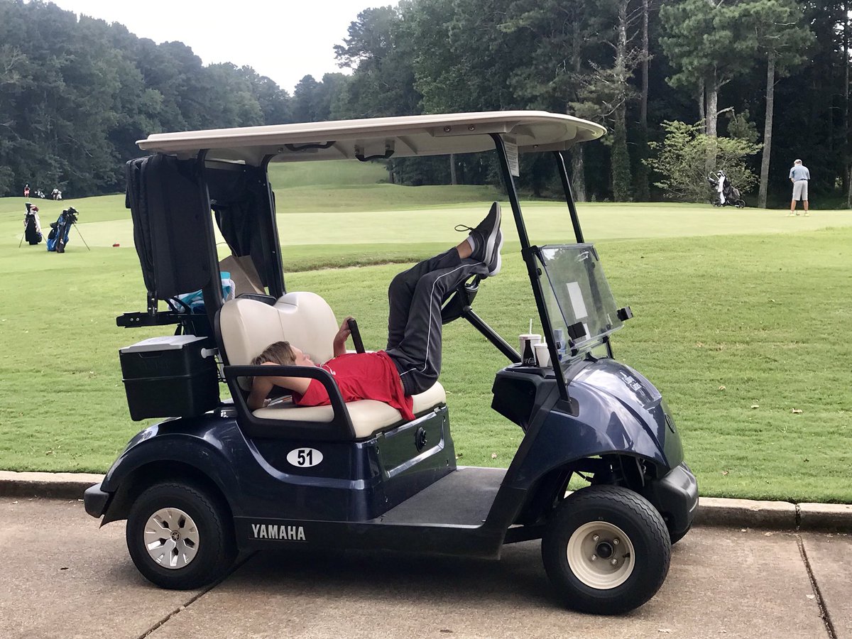GolfLikeAMann's tweet photo. This kid. Just hanging on #18 watching them come in. 😁😂⛳️ #BlaydM #littlebrother #golf #golfcart https://t.co/3AqWw97xP0