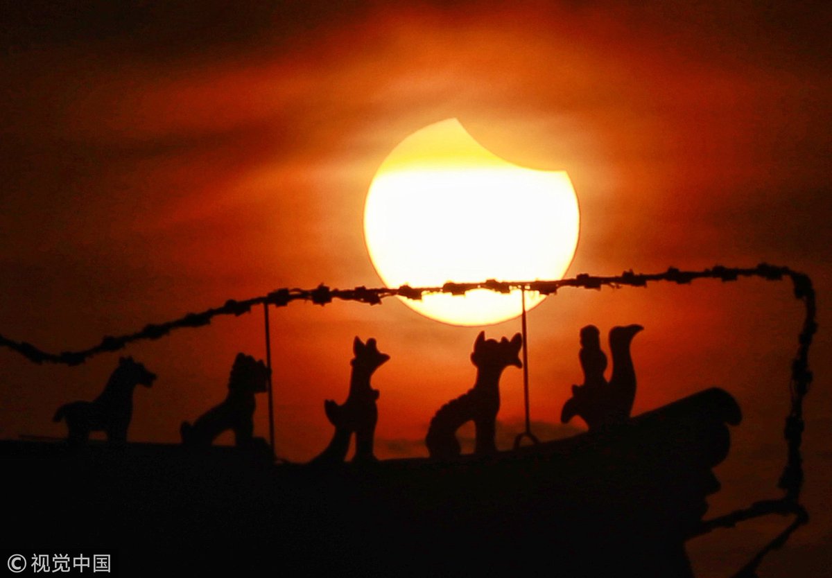 CGTNOfficial's tweet photo. Astonishing partial solar eclipse seen in China #SolarEclipse2018 https://t.co/jCmxvdgcA9