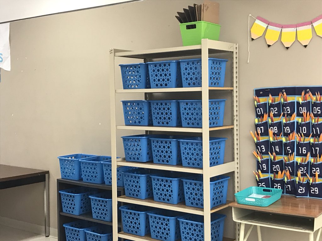 wife_mom_math's tweet photo. No desks... no problem! Our Student Storage Center is going to be AMAZING! AND this teacher wonβt have to worry about messy desks/playing in desks during instructional time! #FirstYearTeacher #TeachSLPS #MrsNoellesWorldChangers https://t.co/KdCNSfegpa