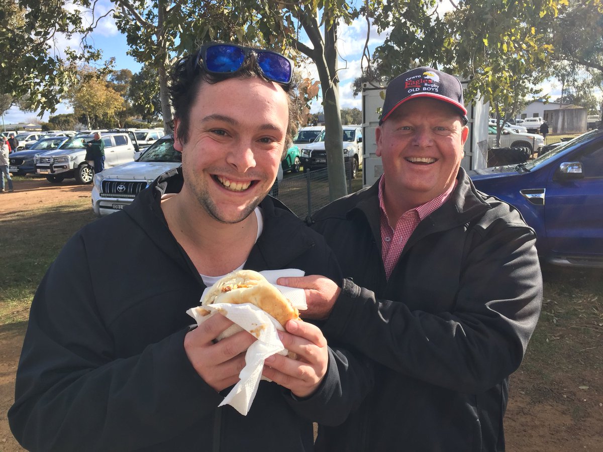PeteGuth's tweet photo. The moment we’ve all been waiting for - Eagles Nest #canteenchat. Five years since Cowra’s hosted finals footy and they’ve delivered. Pulled beef with the lot: beef, sausage, bacon, egg, onion, cheese and rich gravy. Simply superb. 11/10 mignons. Forgot there’s footy on #CWRU18 https://t.co/k3c9ql2zIZ