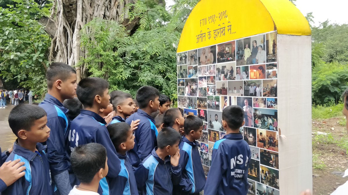 FTIIOfficial's tweet photo. Young visitors going through our Milestone board that illustrates the journey of #FTII through pictures. #OpenDay #Pune #FTIIOpenDay https://t.co/9ermGNLyxT