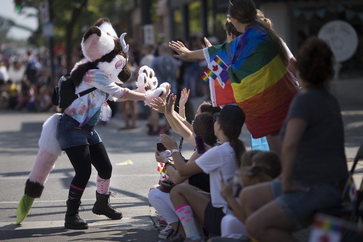 DaxMelmer's tweet photo. Participants in the @WEPridefest Parade danced and cheered their way down Ottawa St. where festivities continue at Lanspeary Park all afternoon and into the evening. #pridefest #YQG #Windosr https://t.co/txc6ZtlUV1