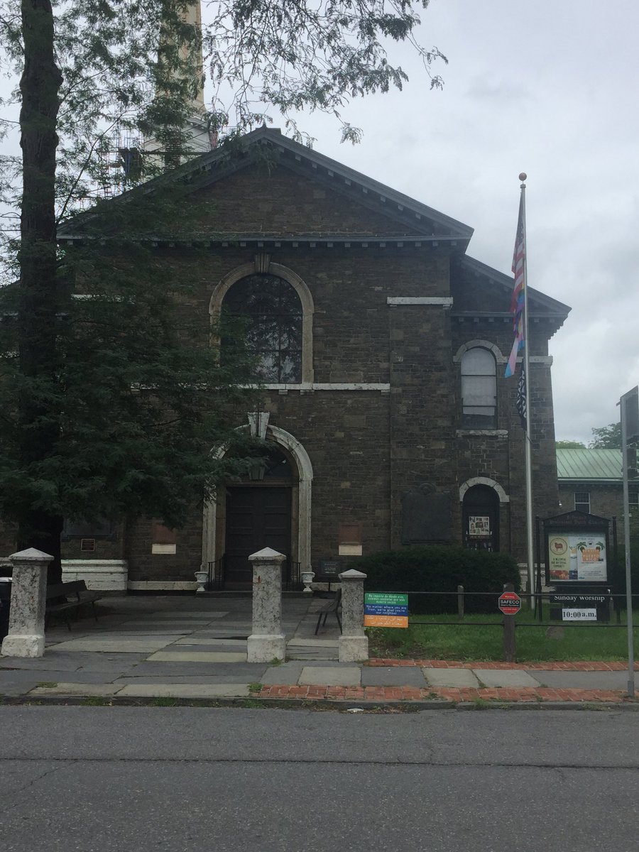 meganromer's tweet photo. You can’t really see, but this really wonderful church has, on their flagpole, a rainbow flag, a trans pride flag, and a Black Lives Matter flag. I love churches that aren’t only affirming and welcoming but also loud and proud about it. #TableForEveryone #Scooch https://t.co/6W6GSEXap9
