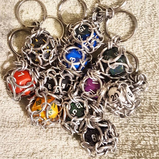 RabbitDance's tweet photo. Less than a week until the Pittsburgh Renaissance Festival! I'm getting my chainmaille ready for the show! Is there anything specific you'd like to see?
.
.
.
#chainmaile #chainmaille #chainmail #keychain #keyring #d20 #dice #gaming #gamenight #gamer #ga… https://t.co/5qhmOvx9P3 https://t.co/qlQLAd1SIW