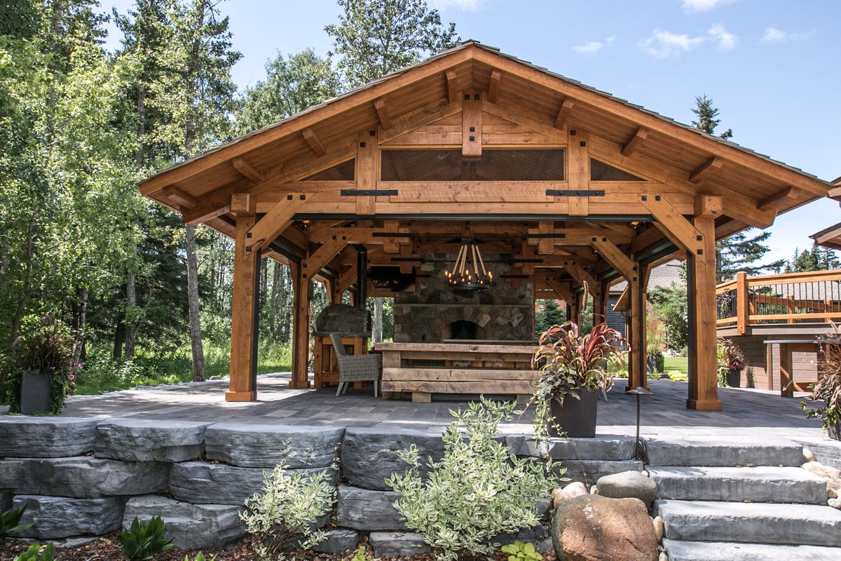 Collyerconstruc's tweet photo. We built this custom timber frame outdoor kitchen space to maximize this customer's enjoyment of our incredible Manitoba Summers.  So many great features including a pizza oven, custom furniture and an incredible fireplace!  We will be sharing more photos of this great space! https://t.co/gnYaZMjF6L