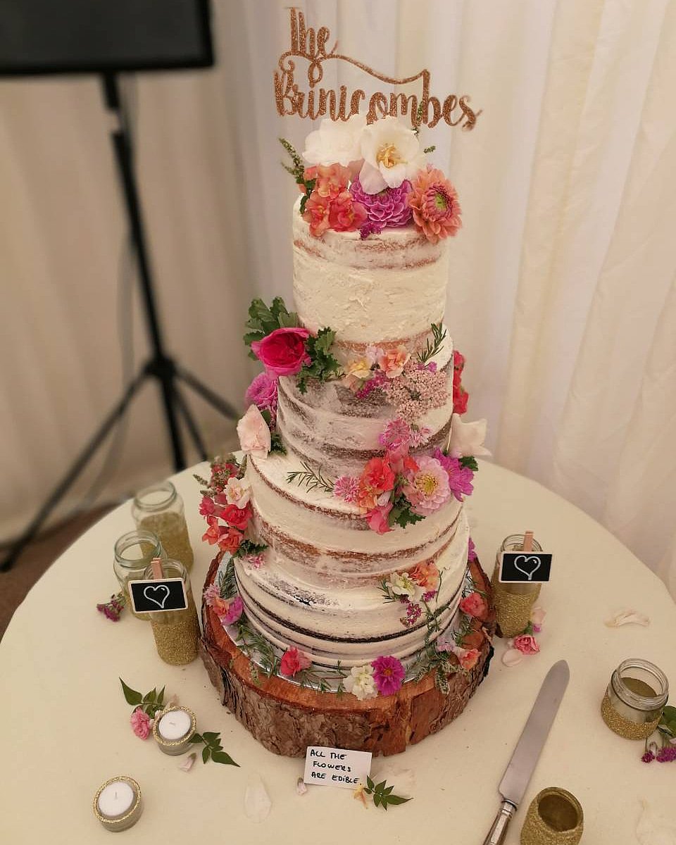 4 TIER BEAUTY delivered and set up at the wedding venue at the beginning of August, all different flavours, all edible flowers and all 100% vegan 💚 
(We're closed till 24th August, if you wish to order something afterwards please get in touch with enough notice given via email💚