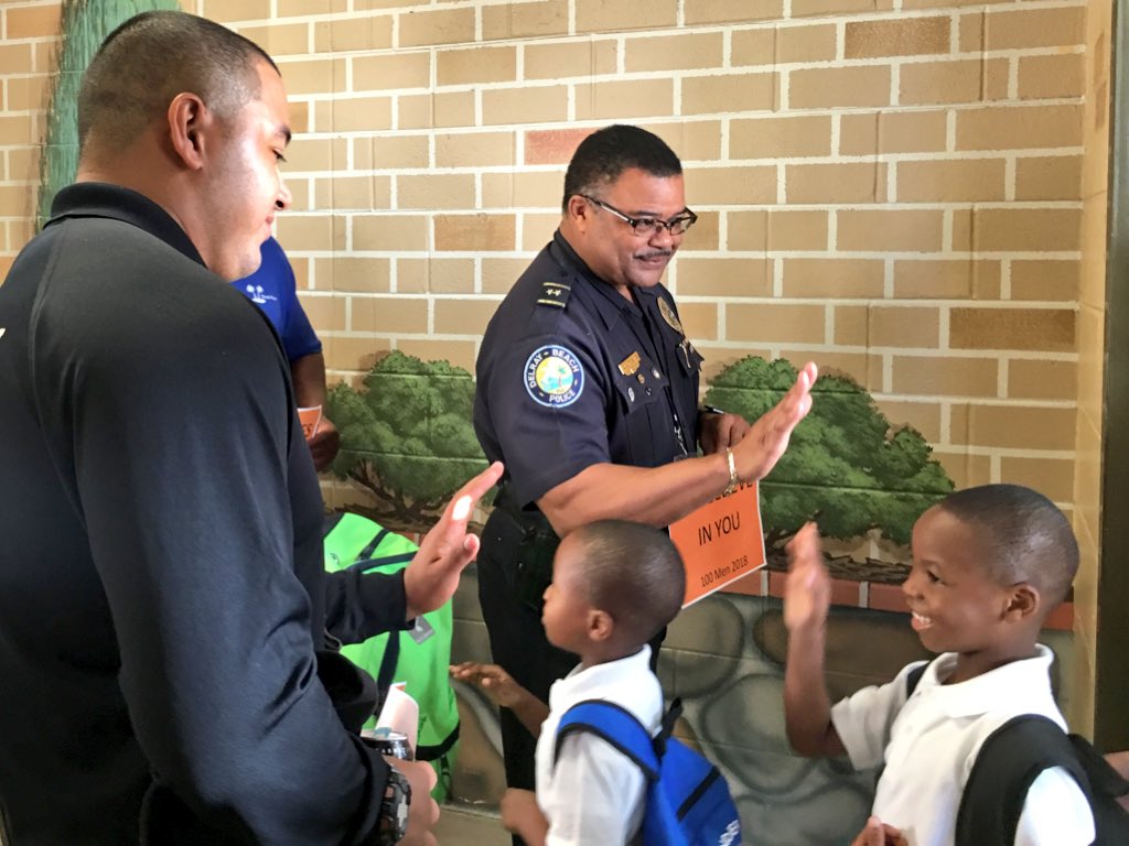 luluramadan's tweet image. A tradition on the first day at Village Academy in Delray Beach, students and parents are greeted by dozens of “father figures” from the community at the main entrance, including Acting Police Chief Javaro Sims (center) // @DelrayBeachPD @pbcsd