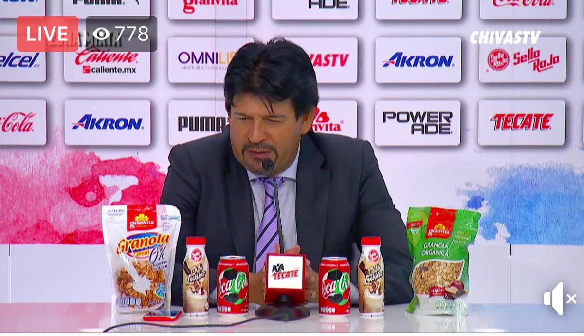 sgevans's tweet photo. If you think the Premier League is over-commercialised, check out the range of product placement at the presser of Mexican club Chivas ( via @mexicoworldcup ) . https://t.co/XQZlVYNOBL