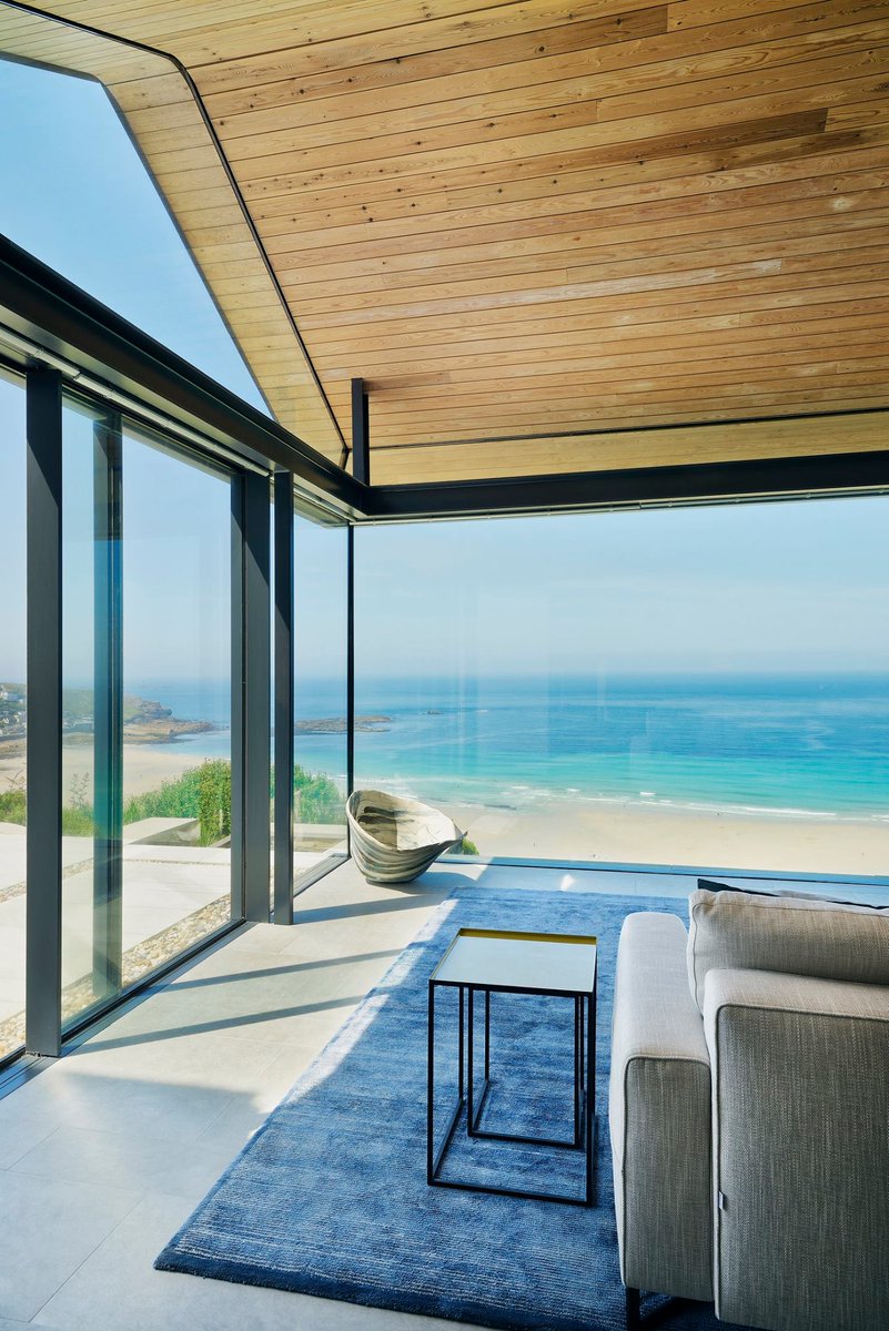 Üni_Slide sliding doors were the perfect product to achieve panoramic views of this stunning location in Sennen, Cornwall - Architect Stan Bolt fensteruk.net/unislide-doors