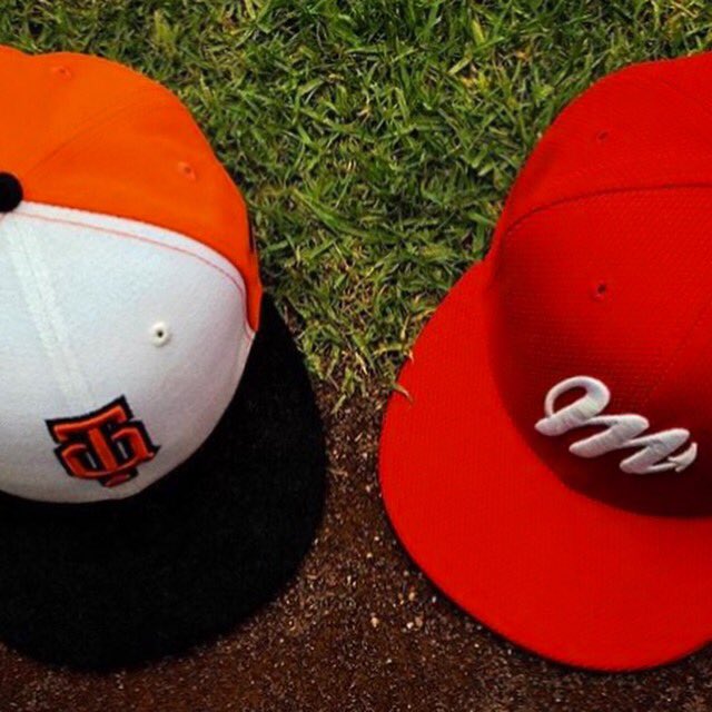 Gorras de los Tigres de Quintana Roo y Diablos Rojos del México, equipos de la Liga Mexicana de Beisbol (LMB).