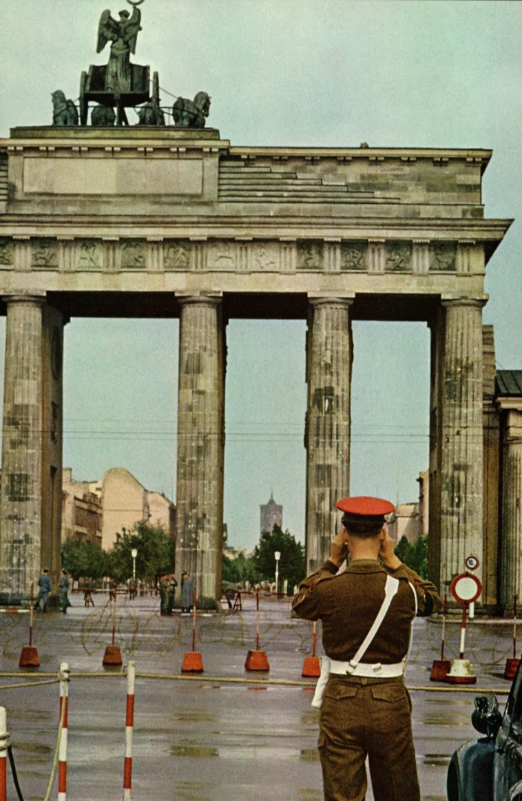 NatGeoLibrary's tweet photo. #OTD in 1961, East German soldiers and workers began using barbed wired and cement blocks to divide Berlin. "Barbed Wire Sunday" was Day 1 of the future #BerlinWall and 28 yrs. of enforced separation between east and west. Pix and excerpt from Dec. 1961 @NatGeoMag. #DeathStrip https://t.co/3WJpzk40Ya
