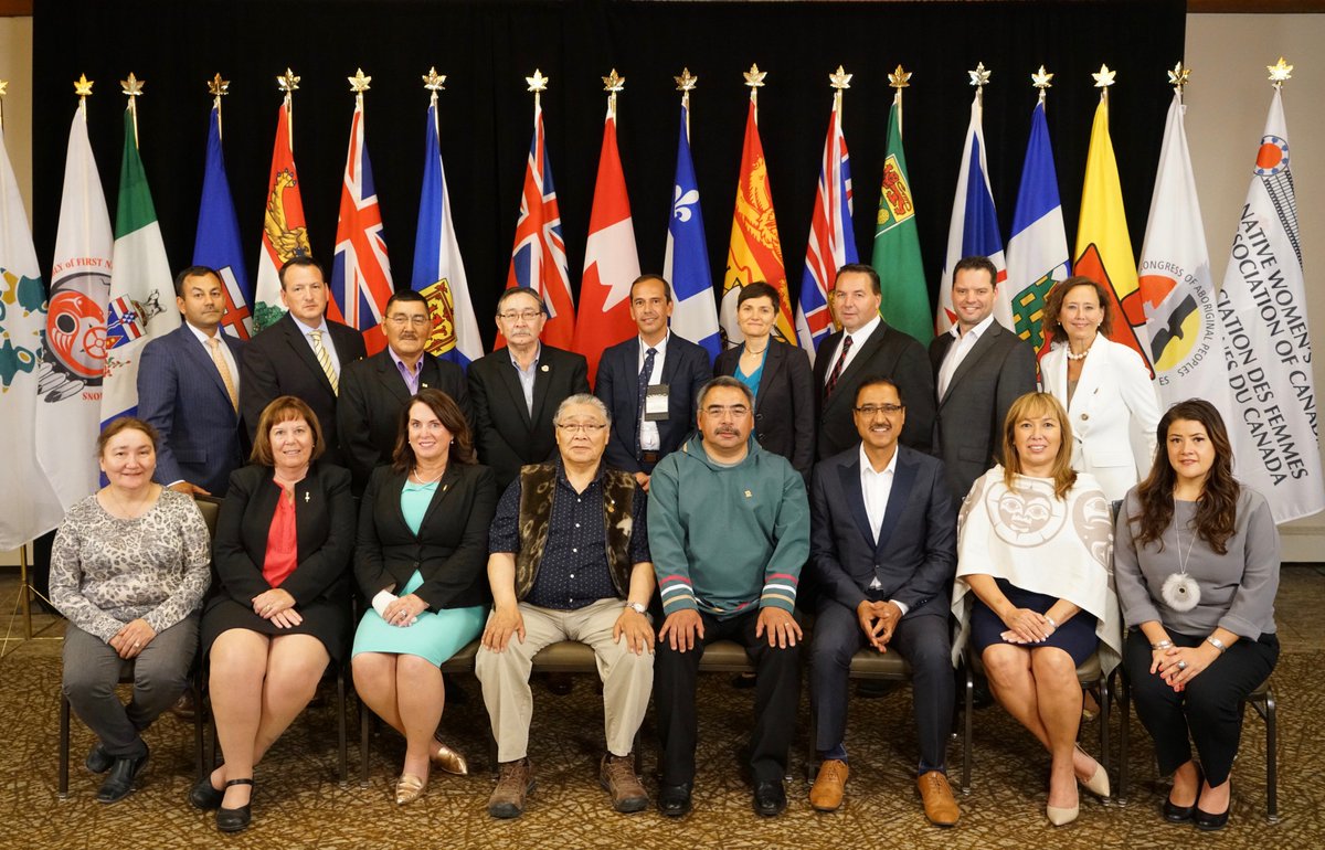 NRCan's tweet photo. Minister Sohi, #Indigenous leaders and other ministers pose for an official photo after a productive session reflecting on the issues discussed so far at #EMMC2018, including the future of #energy and #mining in Canada and opportunities for Indigenous peoples. https://t.co/5cz02zaztT