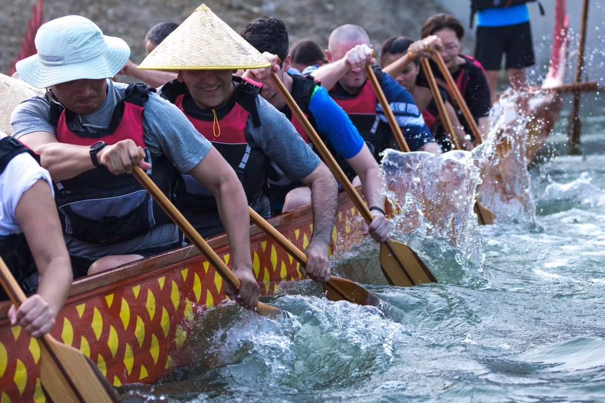 UWCCSC's tweet photo. As one of the bonding activities at the start of the new school year，on 10th Aug. ，teachers and staff had so much fun during a Dragon Boat race on Kuncheng lake which surrounds the beautiful campus of UWC Changshu China. （Photo credit to Jimmy Zheng） https://t.co/gjbbpp8Moo