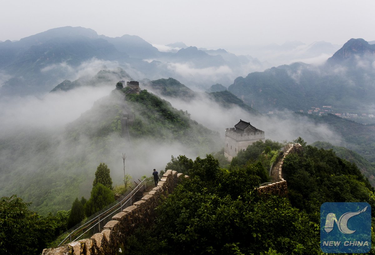 Shrouded in mist is the Great Wall of Huangyaguan section after a rainfall in Tianjin, north China