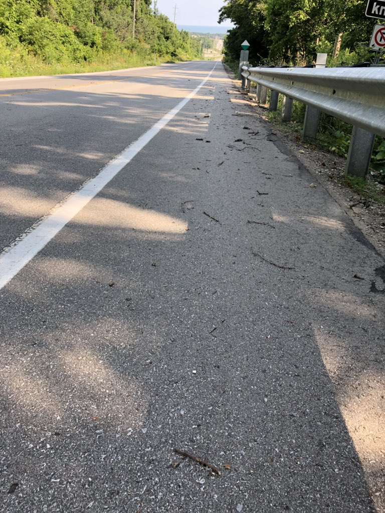 pkings's tweet photo. @GreyCounty can you please have someone clean up the roadway and paved shoulder on Scenic Caves road?  Work crews left a mess this morning with the wood chipper.  Thank you. https://t.co/xfNx1GXsIq