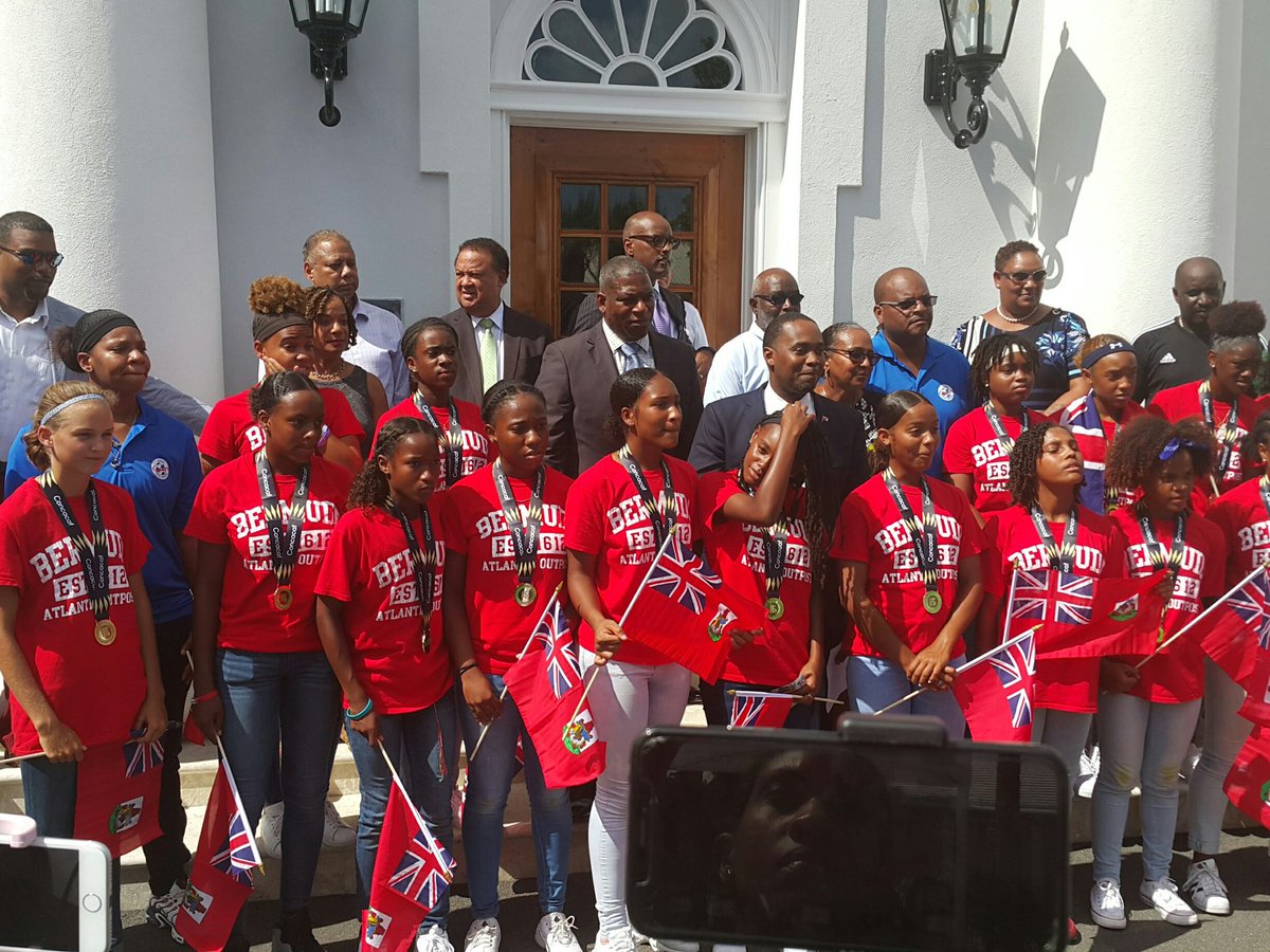 BdaGovernment's tweet photo. The #CONCAFA Girls Division 2 Champions arrive in Hamilton to meet @BermudaPremier and members of Parliament #Football #Division2Football #BermudaFootball #Bermuda https://t.co/IUNvOxEPZx