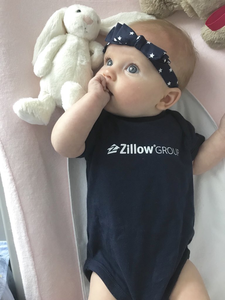 Penelope - rocking her #zuperstar headband and Zillow onesie today😄. #zglife