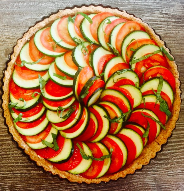 SoYummyCom's tweet photo. Made daily from fresh, #organic, #glutenfree, dairy-free, and soy-free ingredients, each slice of the Savory Tart from @pureganic_cafe contains almonds, rolled oats, olive oil, cashew sunflower ricotta “cheeze”, tomato, zucchini, and basil. See more #food: https://t.co/dkqtKIaUxs https://t.co/SvzbNYMhAv