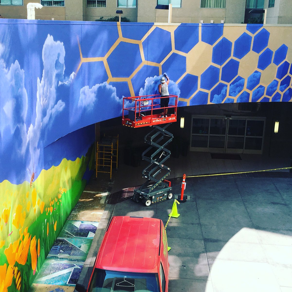 Sacramento artist Anthony Padilla works on his mural at the Marriott Residence Inn at 15th and L. #wideopenwalls916 #wideopenwalls