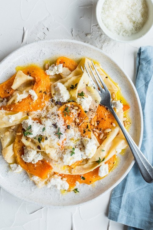 The pasta on this beautiful plate is called handkerchief pasta, named for it's thin, flat appearance.

If you're up for the challenge, this recipe instructs you on how to make it from scratch, then pair it with roasted pumpkin and ricotta: bit.ly/2JP8Vjq