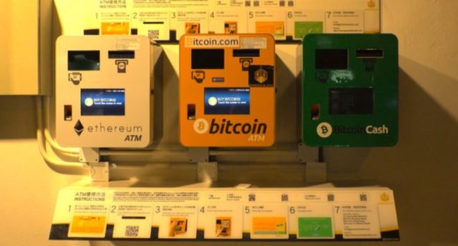 ButtCoin's tweet photo. the eth atm says “buy bitcoins” on the screen, the bitcoin atm has a bitcoin cash website sticker on it, and the bitcoin cash atm is broken. 

good job all around imo https://t.co/Qn3Guew89C