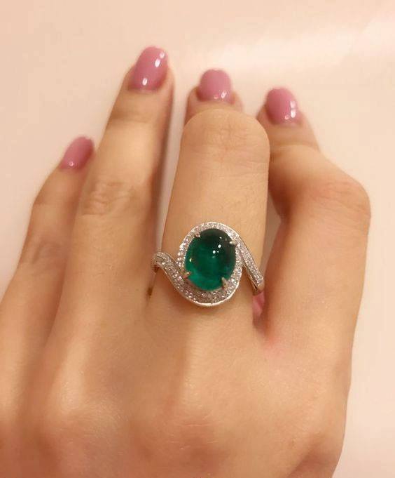 Beautiful Emerald Ring on Woman`s Short Finger Stock Photo - Image of  short, beautiful: 166943480